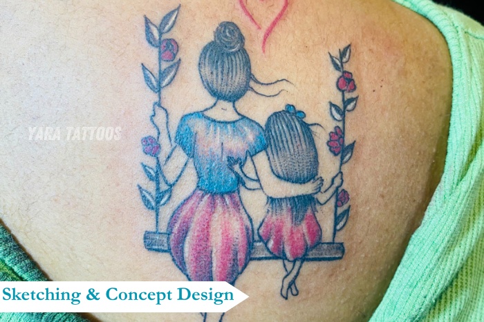 Customized Mother and Daughter Tattoo by Yaara Tattoos in Coimbatore, featuring a heartfelt swing design that symbolizes unconditional love, care, a